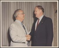 Photograph of William P. Clements and Representative Richard Smith, undated.