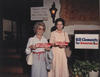 Clements supports holding bumper stickers during the 1986 campaign [e_cle_013454]